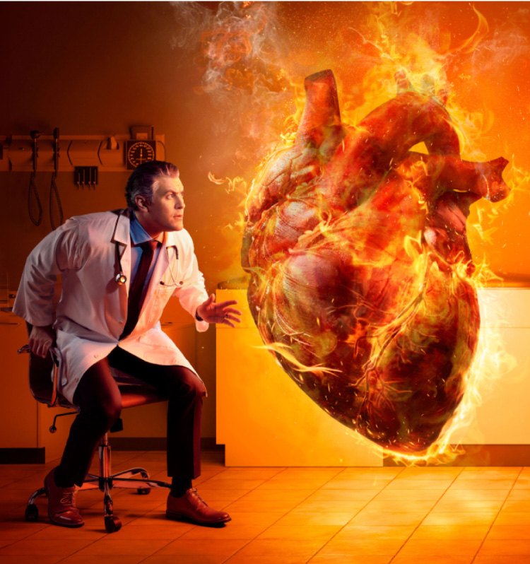 Doctor jumping out of his chair next to a large flaming heart
